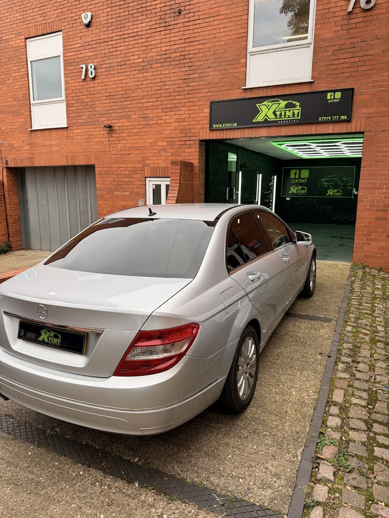Silver Mercedes C-Class outside the XTINT Nottingham unit